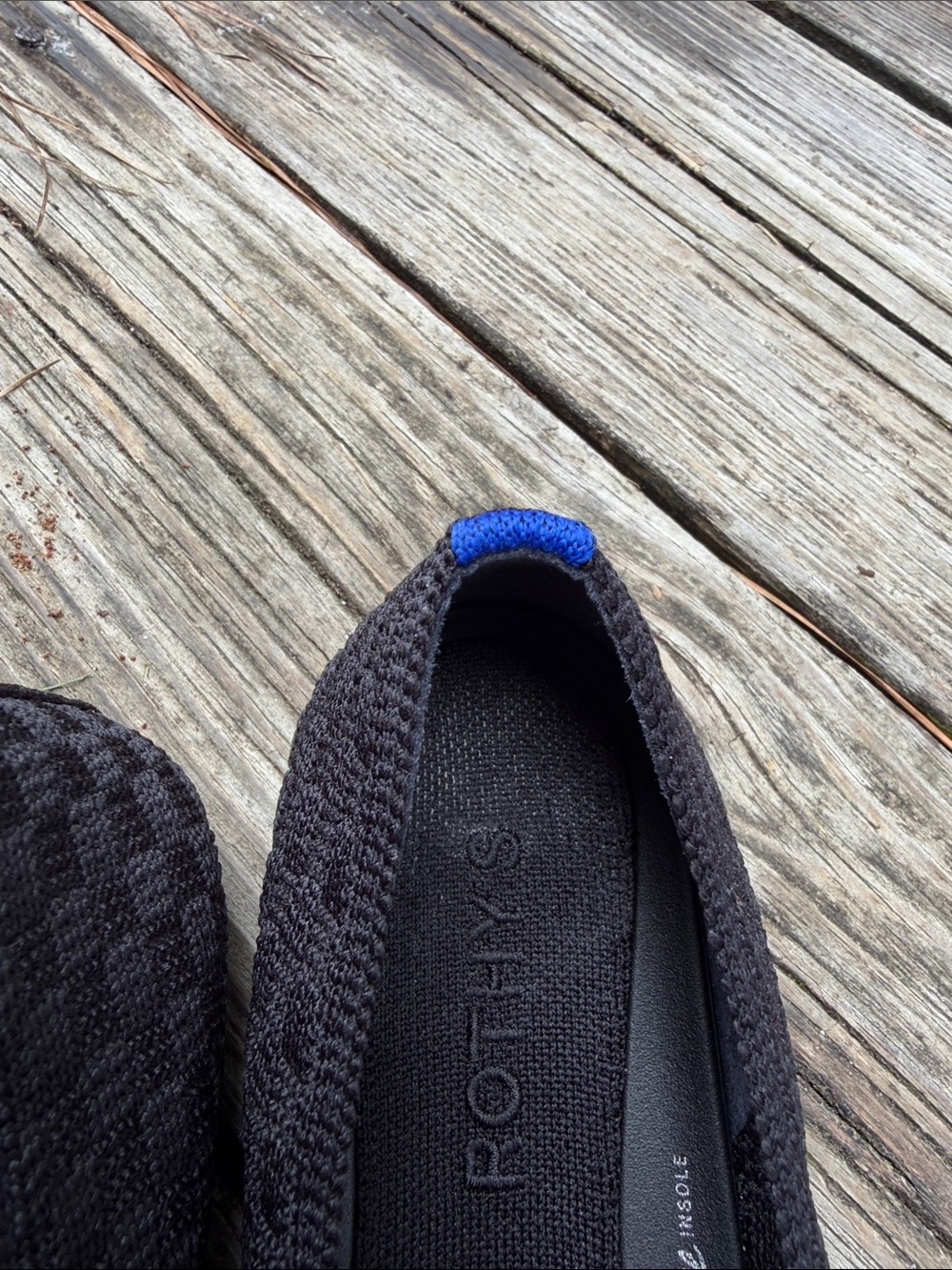 Rothy's Black Knit Flats with Royal Blue Heel Tabs - Picture 7 of 7